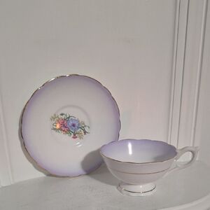 This is a vintage Royal Stafford Lavender bone china teacup and saucer set